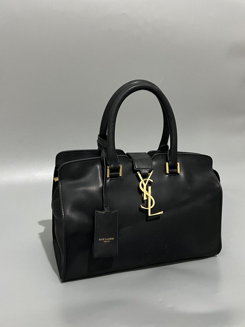 Saint Laurent - YSL - Hand Bag - Leather (Category: Shoulder Bags) located in Cavite. Submitted by asianluxe (Listing ID 1470899299, Image 2). Description: Saint Laurent Paris - YSL - Measurements! Length: 8.5 Inches Width: 11.5 Inches Depth: 4.5 inches Good condition Very presentable No flaw or damage!.
