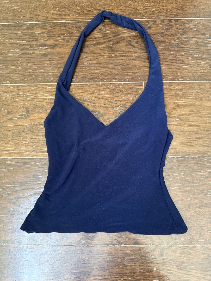 SALE!! mera halter top bundle pink and navy!! (Category: Sleeveless) located in Manila. Submitted by shopmnl.studio (Listing ID 1470781439, Image 2). Description: - Set of 2: Baby pink and navy blue - V-neck design with thick halter straps - Soft and stretchy fabric, perfect for warm weather - Versatile basics for layering or wearing on their own - Fits true to standard sizing - Condition: Clean, no flaws noticed.