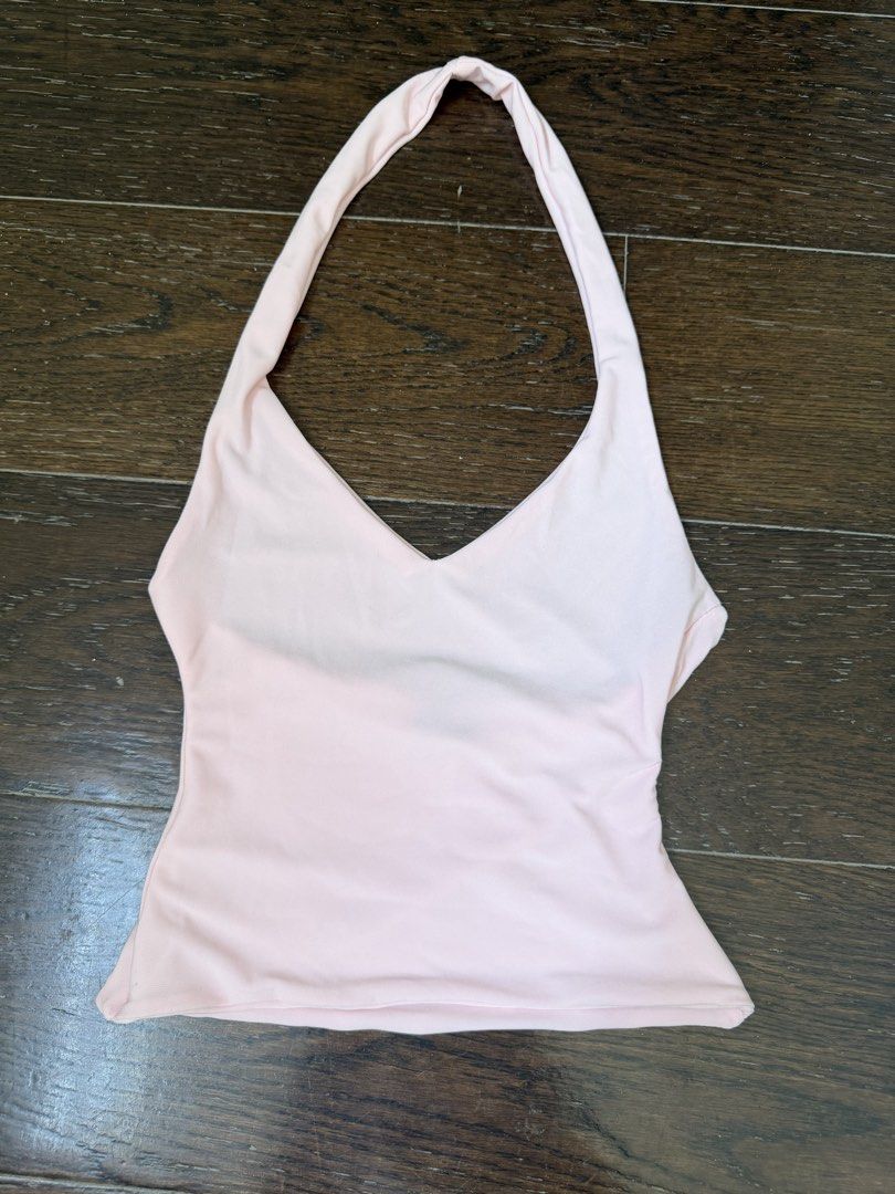 SALE!! mera halter top bundle pink and navy!! (Category: Sleeveless) located in Manila. Submitted by shopmnl.studio (Listing ID 1470781439, Image 1). Description: - Set of 2: Baby pink and navy blue - V-neck design with thick halter straps - Soft and stretchy fabric, perfect for warm weather - Versatile basics for layering or wearing on their own - Fits true to standard sizing - Condition: Clean, no flaws noticed.