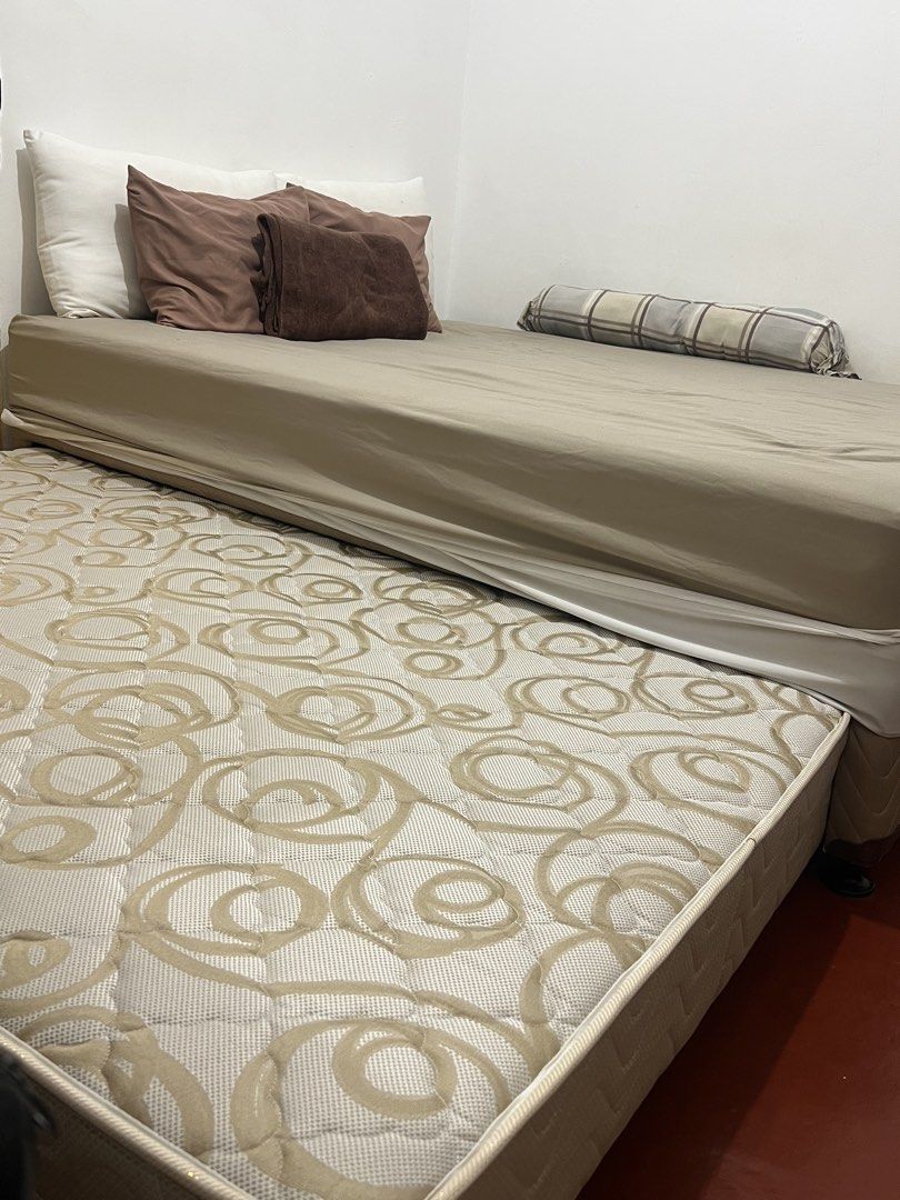 Salem Nite & Day Soft Firm Spring Bed with Pull-Out Bed (Category: Bed Frames & Mattresses) located in Manila. Submitted by gentlecrystal_8adcf4 (Listing ID 1470752328, Image 1). Description: - Brand/Model: Salem Nite & Day Spring Bed System - Type: Double size bed with pull-out lower trundle mattress - Dimensions: 198.12 cm (L) x 152.4 cm (W) x 54 cm (H) - Design: Elegant cream and beige patterned upholstery with solid neutral base - Inclusions: