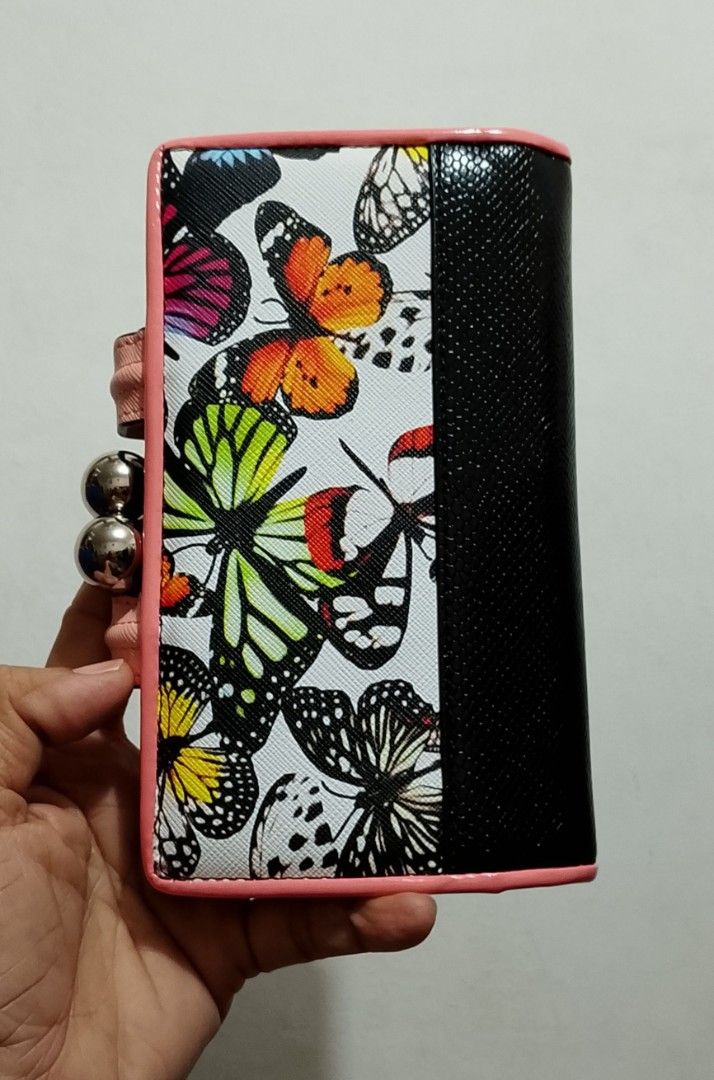Sally Young Wallet (Category: Wallets & Card holders) located in Tarlac. Submitted by faithfulfinds (Listing ID 1470867846, Image 2). Description: Sally Young Butterfly Wallet/Clutch Good as brandnew With multiple cardholders and kisslock. Perfect sa mga dalaga niyo..