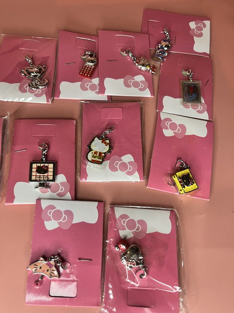 Sanrio Hello Kitty Charm Collection Assorted Designs (Category: Charms) located in Caloocan City. Submitted by snapshop_ph (Listing ID 1470819034, Image 3). Description: - Authentic Kitty metal clasp charms - Comes on cute pink backing cards in original packaging - Variety of designs including TV, umbrella, calculator, and character portraits - Perfect for accessorizing bags, keys, or lanyards.