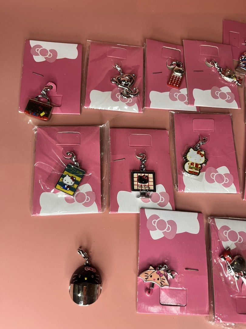 Sanrio Hello Kitty Charm Collection Assorted Designs (Category: Charms) located in Caloocan City. Submitted by snapshop_ph (Listing ID 1470819034, Image 2). Description: - Authentic Kitty metal clasp charms - Comes on cute pink backing cards in original packaging - Variety of designs including TV, umbrella, calculator, and character portraits - Perfect for accessorizing bags, keys, or lanyards.