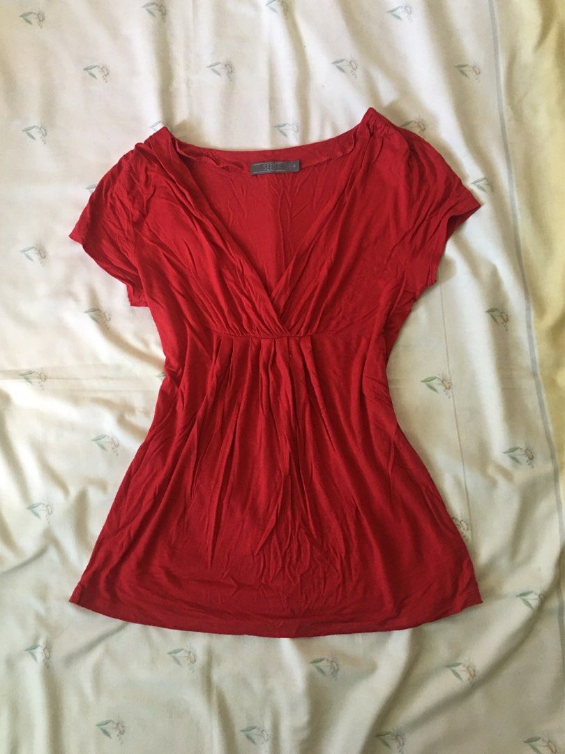Seed 2000s Y2K Cherry red Short Sleeve Top (Category: Blouses) located in Cabuyao City. Submitted by 4everblooms (Listing ID 1470772981, Image 1). Description: - Size: Up to Large - Design: V-neck, pleating under the bust - Fit: Flowing and comfortable - Fabric: Soft and Stretchable .