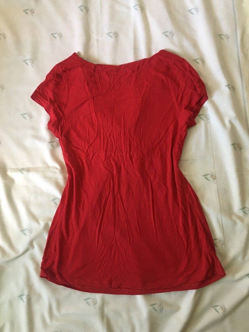 Seed 2000s Y2K Cherry red Short Sleeve Top (Category: Blouses) located in Cabuyao City. Submitted by 4everblooms (Listing ID 1470772981, Image 2). Description: - Size: Up to Large - Design: V-neck, pleating under the bust - Fit: Flowing and comfortable - Fabric: Soft and Stretchable .