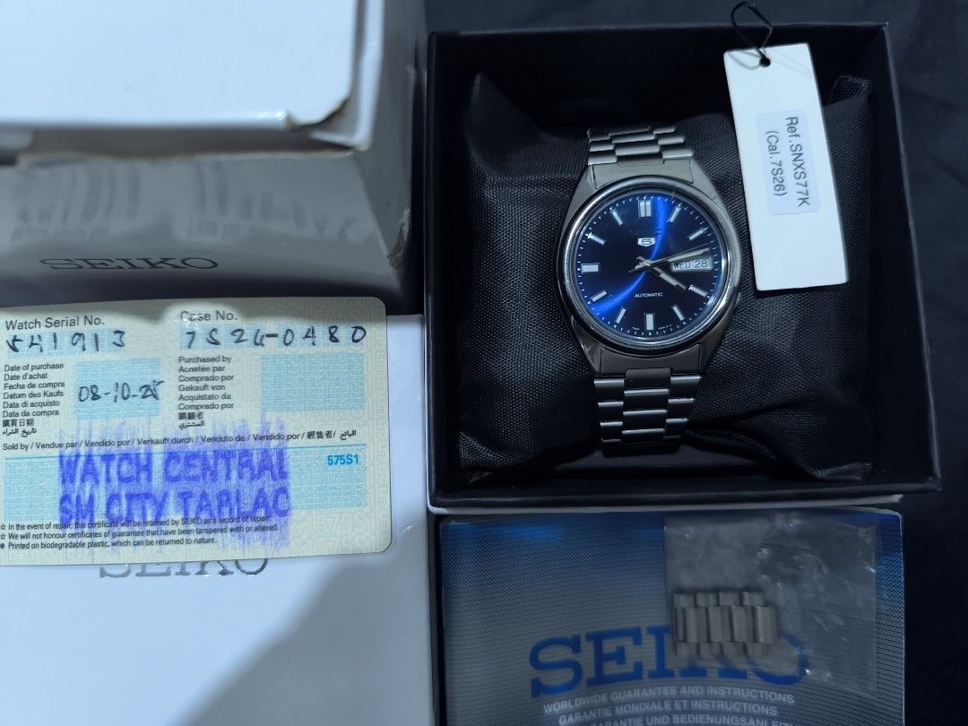 Seiko 5 SNXS77K (Category: Men's Watches) located in Iriga City. Submitted by chris569 (Listing ID 1470816995, Image 1). Description: Seiko 5 SNXS77K blue dial Complete inclusions all original parts 7s26 automatic movement Issue: scratches and advance oras Price: ₱4500 nego Cam Sur location .