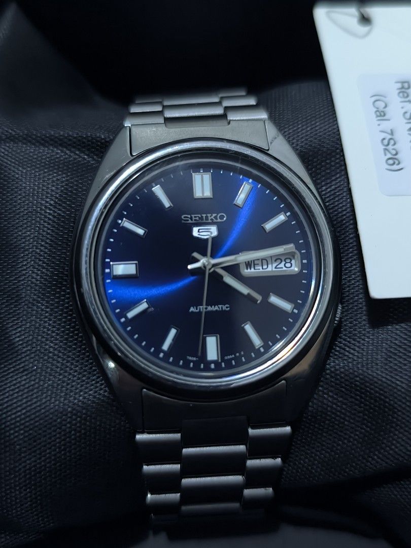 Seiko 5 SNXS77K (Category: Men's Watches) located in Iriga City. Submitted by chris569 (Listing ID 1470816995, Image 2). Description: Seiko 5 SNXS77K blue dial Complete inclusions all original parts 7s26 automatic movement Issue: scratches and advance oras Price: ₱4500 nego Cam Sur location .