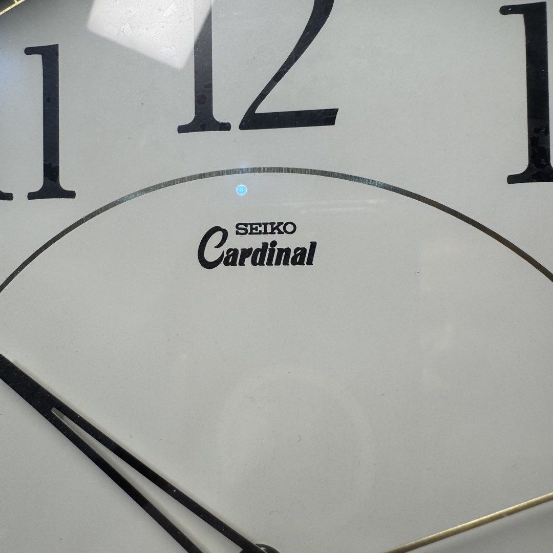 SEIKO Cardinal Wooden Quartz Wall Clock (Model: GL942B) (Category: Clocks) located in Pasig City. Submitted by msjazzylad (Listing ID 1470930122, Image 2). Description: Product Overview Brand: SEIKO Cardinal Model: GL942B Movement: High-quality SKP (Seiko Clock Movement) Quartz Engine Design: Solid dark wooden frame/ring, off-white dial, elegant black numerals, gold-tone accent second hand, and cute red bird logo on dial face. Dimensions: Approx.