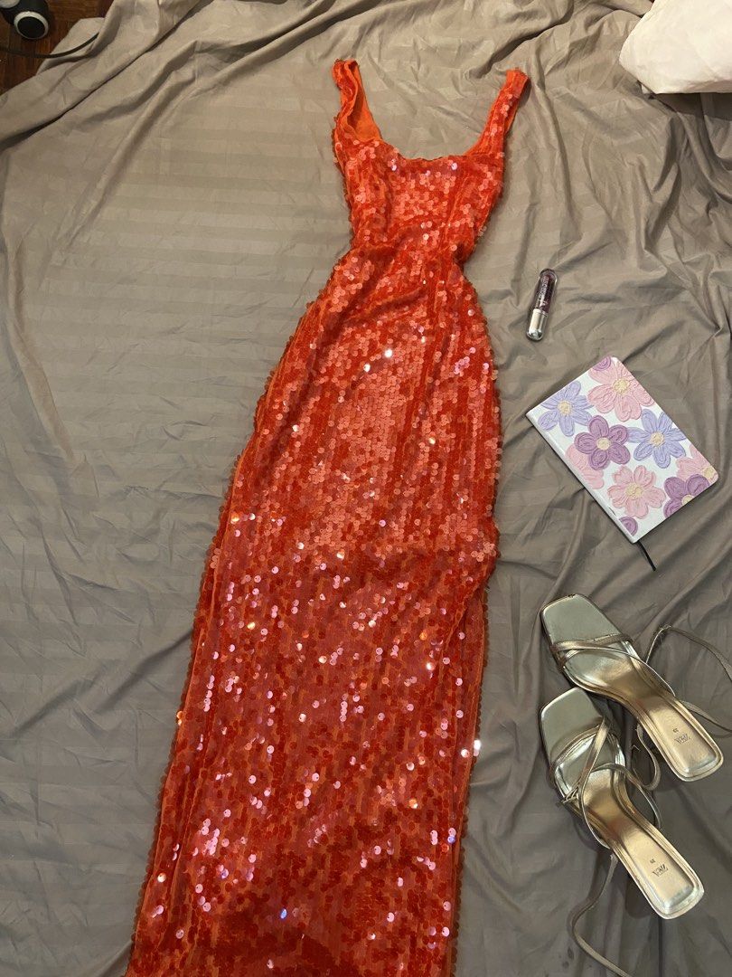 Sequins orange gown with one side slit (Category: Evening dresses & gowns) located in Manila. Submitted by charleneka32549 (Listing ID 1470844877, Image 2). Description: .