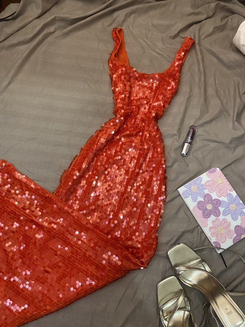Sequins orange gown with one side slit (Category: Evening dresses & gowns) located in Manila. Submitted by charleneka32549 (Listing ID 1470844877, Image 1). Description: .