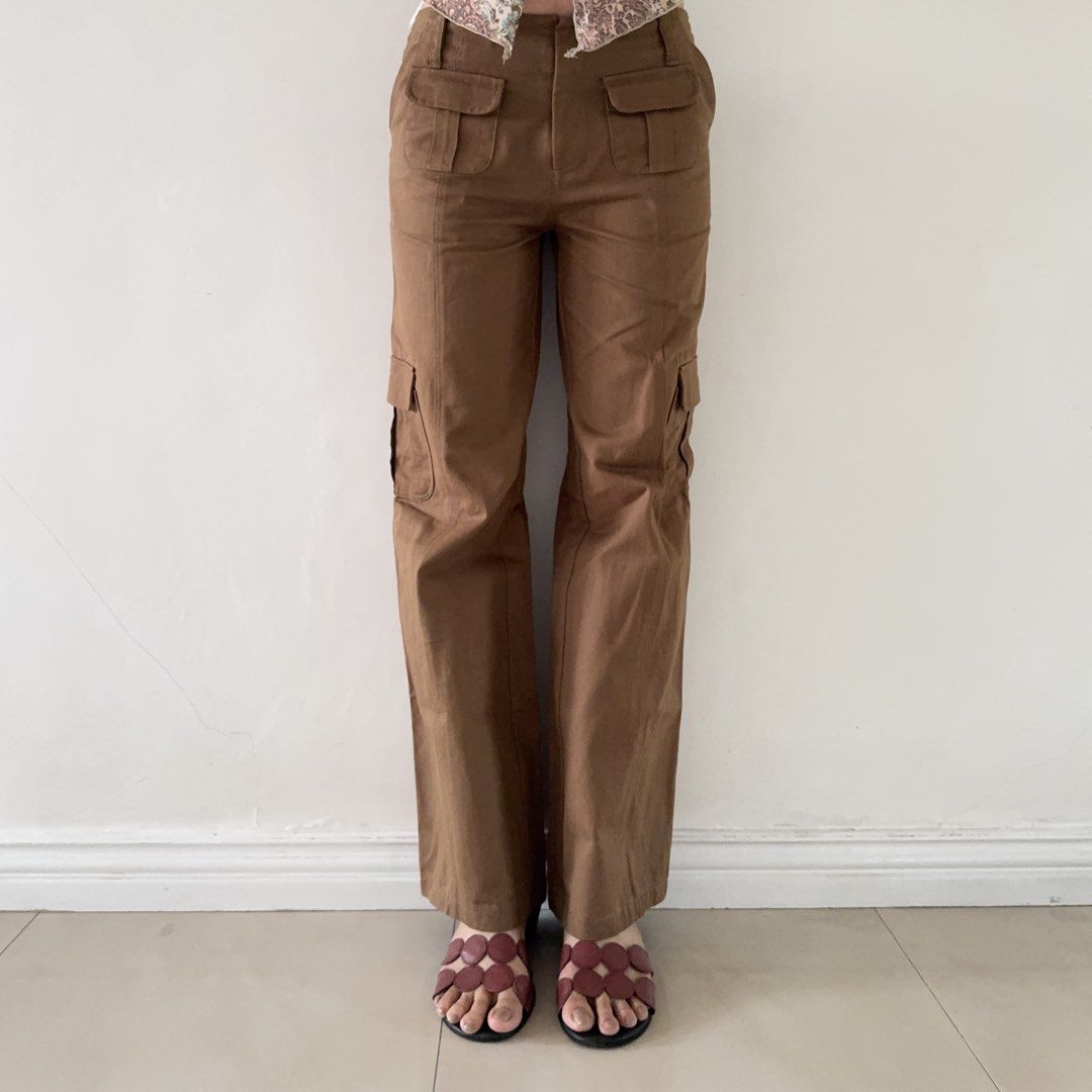 She By Shi Brown Cargo Pants (Category: Jeans) located in Calamba. Submitted by quietarchive (Listing ID 1470820496, Image 2). Description: - Brand: She By Shi - Color: Brown - Fit: Mid-rise, relaxed straight leg - Material: 100% cotton - Details: Functional front and side utility pockets - Style: Casual staple, easy to pair with tees and sandals.