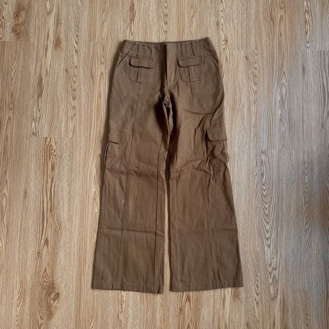 She By Shi Brown Cargo Pants (Category: Jeans) located in Calamba. Submitted by quietarchive (Listing ID 1470820496, Image 3). Description: - Brand: She By Shi - Color: Brown - Fit: Mid-rise, relaxed straight leg - Material: 100% cotton - Details: Functional front and side utility pockets - Style: Casual staple, easy to pair with tees and sandals.
