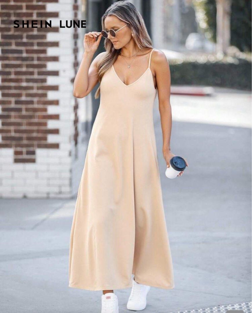 Shein Lune Beige Cami Maxi Dress (Category: Dresses) located in Cabuyao City. Submitted by KookieMonster10 (Listing ID 1470821983, Image 1). Description: -1x Used -Good As New - Style: Sleeveless maxi slip dress with thin shoulder straps and deep V-neckline - Length: Ankle-length - Color: Soft beige (neutral tone) - Perfect for: Casual outdoor hangouts, beach trips, or daily wear - Versatile: Easy to match with sneakers or sandals - Condition: Ex