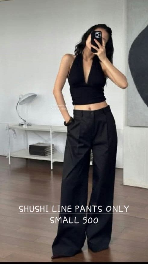 Shushi Line Black Pants Small (Category: Jeans) located in San Mateo. Submitted by reyshel08 (Listing ID 1470753722, Image 1). Description: - Brand/Model: Shushi Line black pants - Size: Small - Fit: High-waisted with wide legs and front pleats - Color: Deep black - Versatility: Super versatile, pairs well with crop tops and tanks - Occasion: Great for both casual days and dressed-up nights.