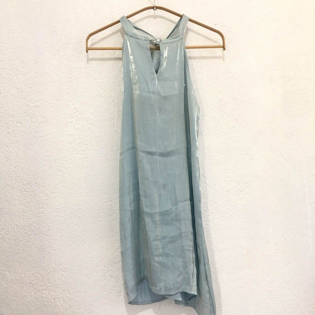 Silk halterneck mini dress (Category: Dresses) located in Subic. Submitted by ayvee.ph (Listing ID 1470842612, Image 3). Description: Silk halterneck mini dress So gorgeous!!✨ With lining💯 Color: Ice blue A must have mga sis Excellent cond No issue / No flaws No when worn (never worn) Size: Small Bust: Upto 34 Length:33 📌Measured via tm Price: 400 📍Olongapo / Subic 🚛Reg J&T door to door del Mine now pay tom No cancellation No rush shipping No