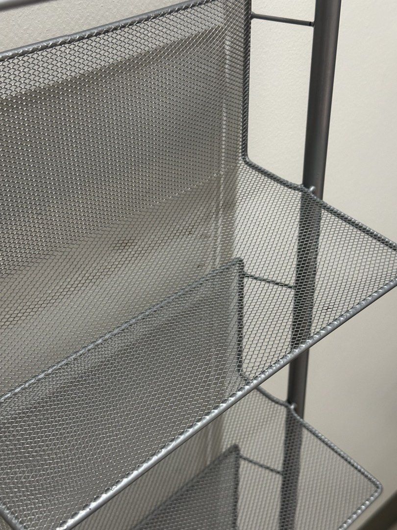 Silver 6-Tier Metal Mesh Shelf Rack (Category: Shelves, Cabinets & Racks) located in Mandaluyong City. Submitted by lexterrr (Listing ID 1470904788, Image 3). Description: Bought from another shop for P1,500. Used and in good condition. Selling because I am decluttering and no longer need it. Details: * 6-tier shelf rack * Silver metal mesh finish * Dimensions: approximately 135cm H x 34cm W x 30.8cm D * Slim design, suitable for small spaces * C
