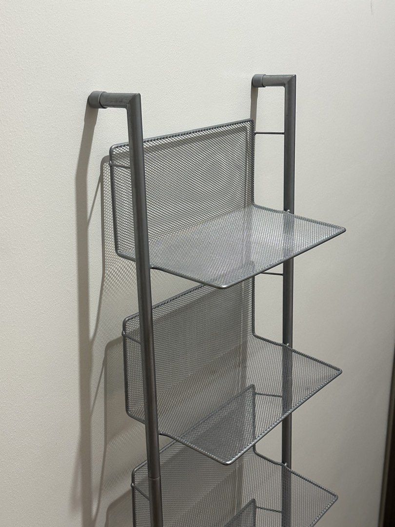 Silver 6-Tier Metal Mesh Shelf Rack (Category: Shelves, Cabinets & Racks) located in Mandaluyong City. Submitted by lexterrr (Listing ID 1470904788, Image 2). Description: Bought from another shop for P1,500. Used and in good condition. Selling because I am decluttering and no longer need it. Details: * 6-tier shelf rack * Silver metal mesh finish * Dimensions: approximately 135cm H x 34cm W x 30.8cm D * Slim design, suitable for small spaces * C