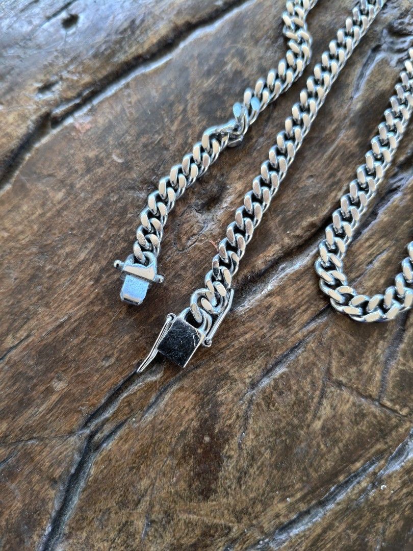Silver Curb Chain Necklace with Secure Box Clasp (Category: Necklaces) located in Manila. Submitted by csbmonday (Listing ID 1470809092, Image 3). Description: Stainless steel curb chain 22 inches length 5mm width -stainless steel curb chain necklace with a classic interlocking link design - Features a secure box clasp closure for peace of mind - Sturdy construction with a solid, premium weight - Versatile and easy to match with any everyday outf