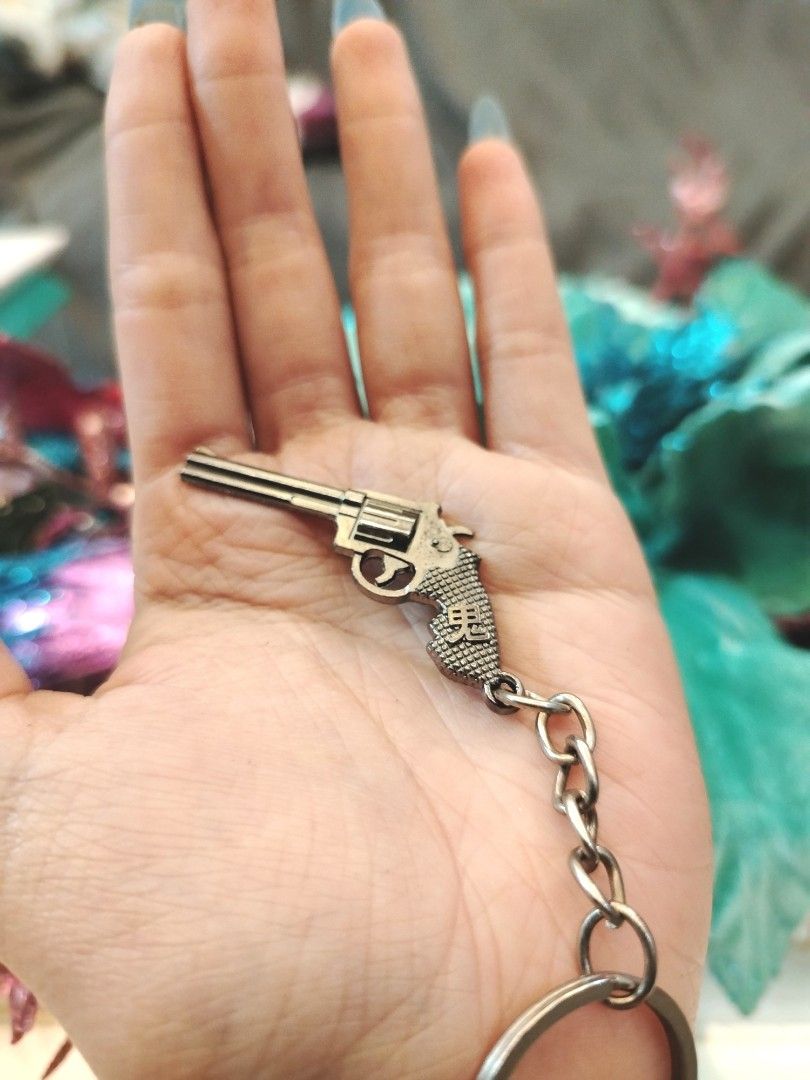 Silver Metal Revolver Gun Keychain Charm (Category: Other Merchandise) located in San Fernando. Submitted by jpmarketplace2023 (Listing ID 1470845006, Image 2). Description: 💚 All items are authentic from Japan. 💛 MOP: GCash (❌️ GCash Protect) 🩵 MOD: LBC only (❌️ S. Checkout, COD, COP) 💙 Meet-up: Vista Mall, San Fernando, Pampanga 💜 All items are on-hand. 🧡 First to pay gets the item first. ❤️ Breakable items are packed with care and cautio
