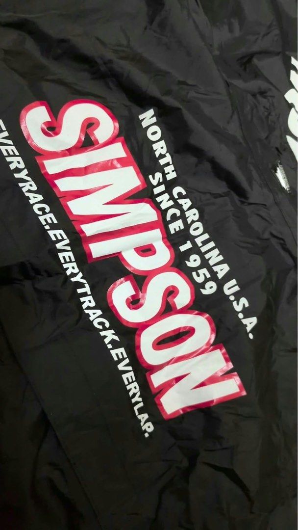 Simpson Black and Red Racing Suit Track Set (Category: Activewear) located in Guagua. Submitted by hampii (Listing ID 1470775350, Image 3). Description: - Simpson black and red racing suit set (Jacket and matching pants included) - Bold Simpson logos printed down the sleeves and legs - North Carolina USA branding on the chest and back - Durable windbreaker-style material, ideal for track days or streetwear - Full zip front jacket with high collar
