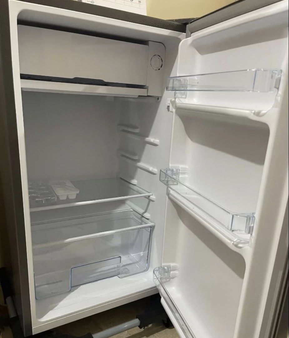 Single Door Mini Refrigerator (Category: Refrigerators and Freezers) located in Makati City. Submitted by dr.thriftshop (Listing ID 1470850511, Image 2). Description: - Brand: CHiQ Single Door Mini Refrigerator - Capacity: 3.5 cubic feet - Color/Finish: Stainless Steel Silver - Dimensions: 474mm (W) x 447mm (D) x 831mm (H) - Condition: Used but not abused (still looks new btw but with minor scratches from normal wear and tear) - Features: Interio