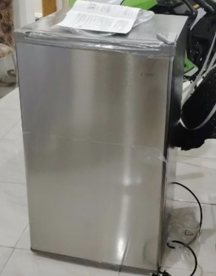 Single Door Mini Refrigerator (Category: Refrigerators and Freezers) located in Makati City. Submitted by dr.thriftshop (Listing ID 1470850511, Image 1). Description: - Brand: CHiQ Single Door Mini Refrigerator - Capacity: 3.5 cubic feet - Color/Finish: Stainless Steel Silver - Dimensions: 474mm (W) x 447mm (D) x 831mm (H) - Condition: Used but not abused (still looks new btw but with minor scratches from normal wear and tear) - Features: Interio