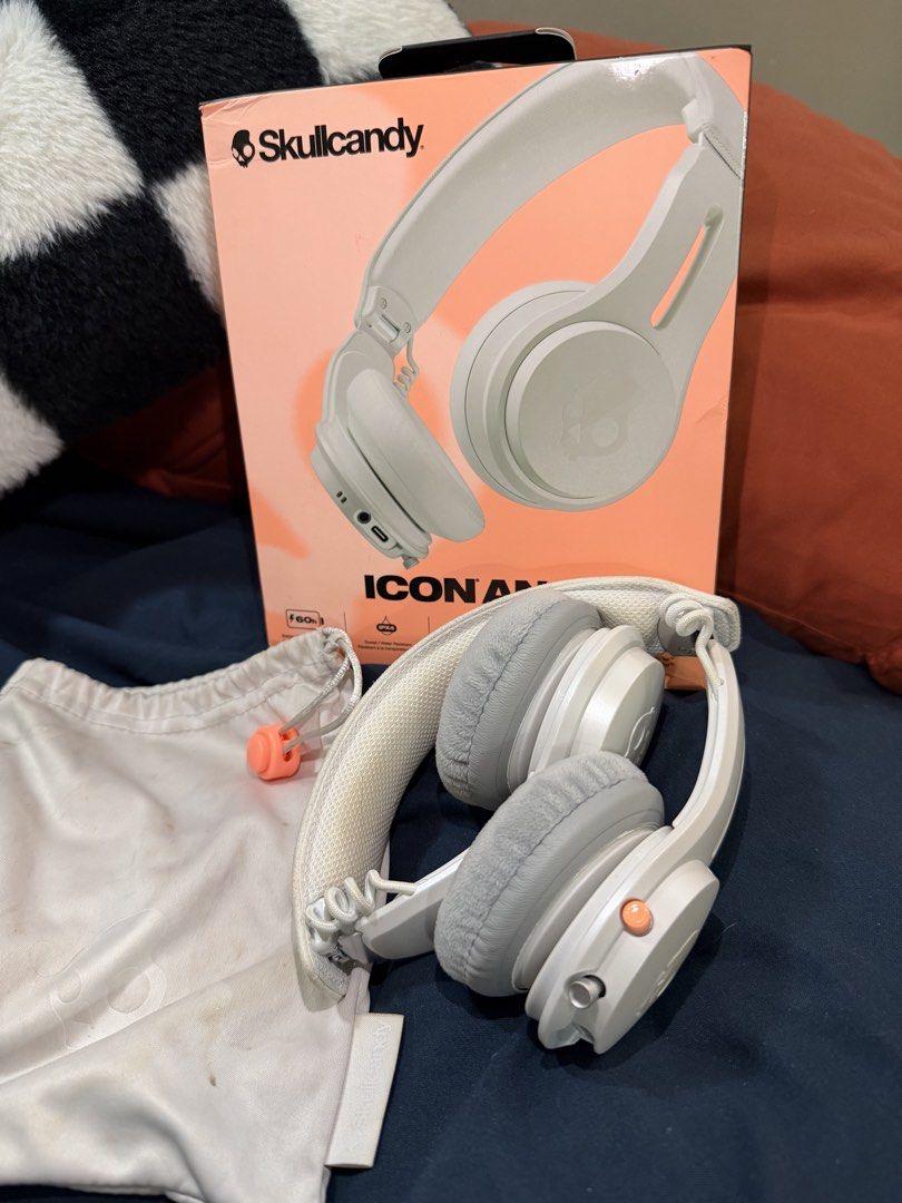 Skullcandy Icon ANC Wireless On-Ear Headphones (Category: Headphones & Headsets) located in Rosario. Submitted by chippycoco (Listing ID 1470810955, Image 1). Description: - Brand/Model: Skullcandy Icon ANC - Color: White with stylish orange accents - Condition: Clean, gently handled, and well-maintained - Key Features: Active Noise Cancellation (ANC), on-ear design with plush cushioned ear pads, and an adjustable headband - Inclusions: Complete 