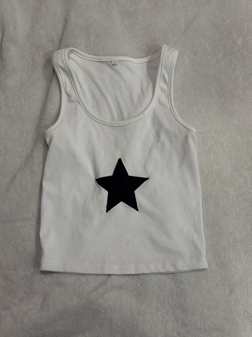 Sleeveless White Star Top (Unbranded) (Category: Sleeveless) located in Makati City. Submitted by 3zra__________ (Listing ID 1470834985, Image 1). Description: Makati City Size Medium can fit Large Bought for 300 Lalamove or grab only .