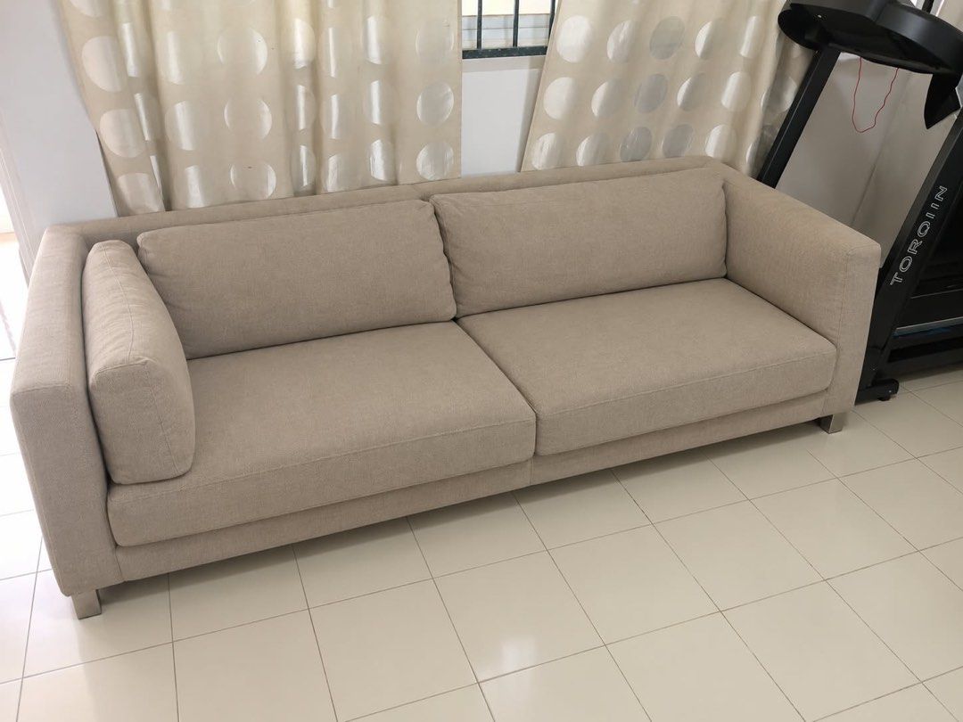 Sofa (Category: Sofas) located in Singapore. Submitted by saucy_zenix (Listing ID 1470756895, Image 3). Description: Selling 2 sofas: * 1 two-seater sofa with matching ottoman/footstool * 1 additional two-seater sofa Both are well-used, with some fading and minor scratches, but still usable. 💰 Price: $50 📍 Self-collection Simei.