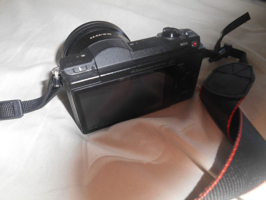 SONY a5100 Mirrorless Camera (Category: Cameras) located in Caloocan City. Submitted by shhye (Listing ID 1470788385, Image 3). Description: FINAL PRICE Inclusions: - Sony a5100 body - 16-50mm kit lens - Camera bag - Brand new strap - FREE 8GB SD card + Extra Battery - Charger (a bit faulty but still works, just letting you know upfront) RFS: Need funds, no longer using it .