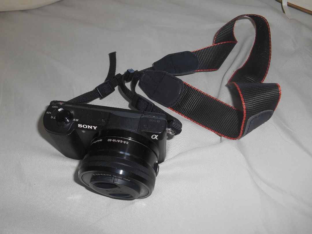 SONY a5100 Mirrorless Camera (Category: Cameras) located in Caloocan City. Submitted by shhye (Listing ID 1470788385, Image 1). Description: FINAL PRICE Inclusions: - Sony a5100 body - 16-50mm kit lens - Camera bag - Brand new strap - FREE 8GB SD card + Extra Battery - Charger (a bit faulty but still works, just letting you know upfront) RFS: Need funds, no longer using it .
