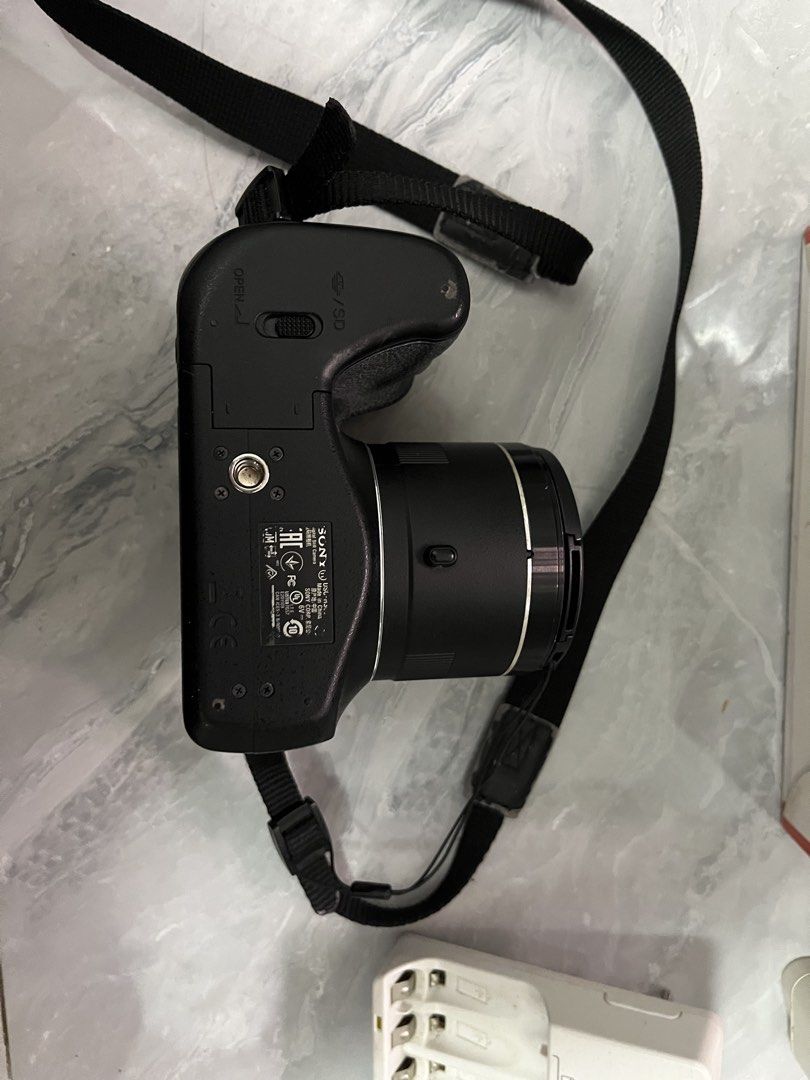 Sony dsc-h300 (Category: Cameras) located in Munoz. Submitted by jaicc (Listing ID 1470786978, Image 3). Description: Sony DSC-H300 with accessories Selling my Sony Cyber-shot DSC-H300 camera. Perfect for travel, concerts, or hobbyists wanting a strong 35x optical zoom camera! Condition & Status: 100% fully functional (flash, autofocus, 35x optical zoom, buttons, and video recording all working) Screen note: Minor screen mold on the LCD screen (c