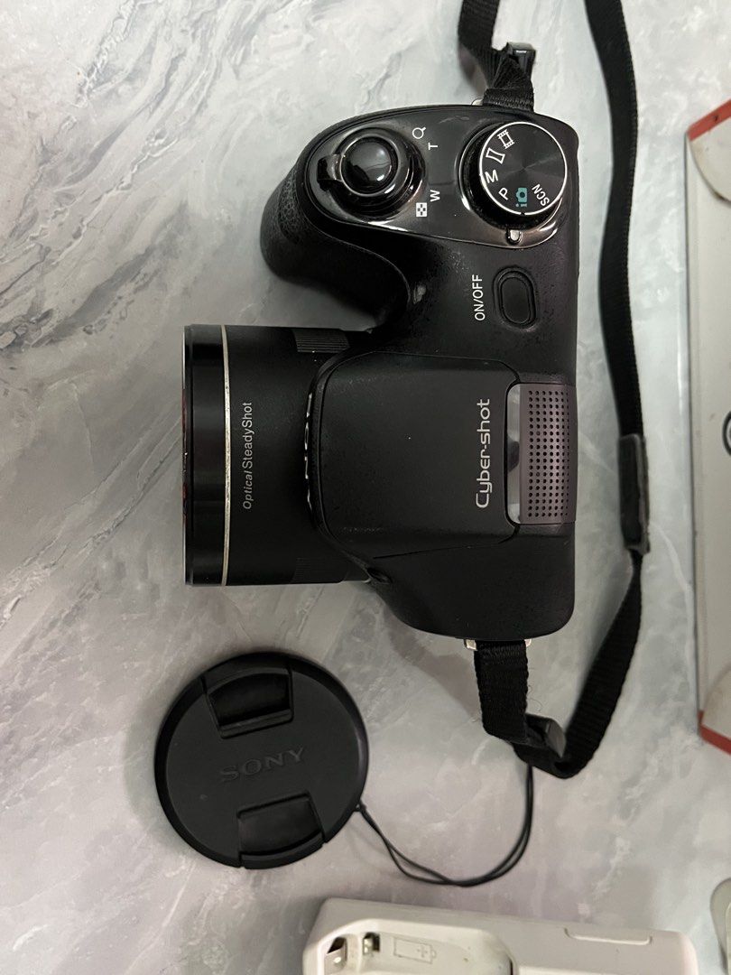 Sony dsc-h300 (Category: Cameras) located in Munoz. Submitted by jaicc (Listing ID 1470786978, Image 2). Description: Sony DSC-H300 with accessories Selling my Sony Cyber-shot DSC-H300 camera. Perfect for travel, concerts, or hobbyists wanting a strong 35x optical zoom camera! Condition & Status: 100% fully functional (flash, autofocus, 35x optical zoom, buttons, and video recording all working) Screen note: Minor screen mold on the LCD screen (c