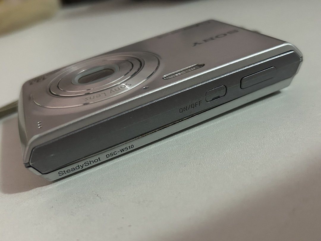 SONY DSC-W510 DIGICAM (Category: Cameras) located in Manila. Submitted by kiaamari (Listing ID 1470845228, Image 3). Description: 📸 FOR SALE: SONY DSC-W510 DIGICAM! ✨ looking for a digicam to capture cute, nostalgic, vintage-style photos? 🤍 this sony steadyshot dsc-w510 is perfect for your travel adventures, everyday moments, and picture-perfect memories! 📷 - CAMERA DETAILS * 12.1 megapixels * 4x optical zoom * 2.7-inch LCD screen * Sweep Pano
