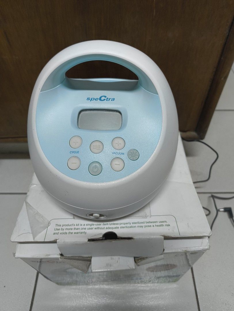 Spectra S1 Electric Breast Pump with Box (Category: Breastfeeding & Bottle Feeding) located in Antipolo. Submitted by kei.regalado (Listing ID 1470862259, Image 2). Description: - Spectra S1 electric breast pump with built-in rechargeable battery - Includes original box (with minor edge/corner wear) - Original power adapter with 3-pin plug included - Complete accessories: tubes, valves, backflow protectors, and flanges - Features adjustable cycle