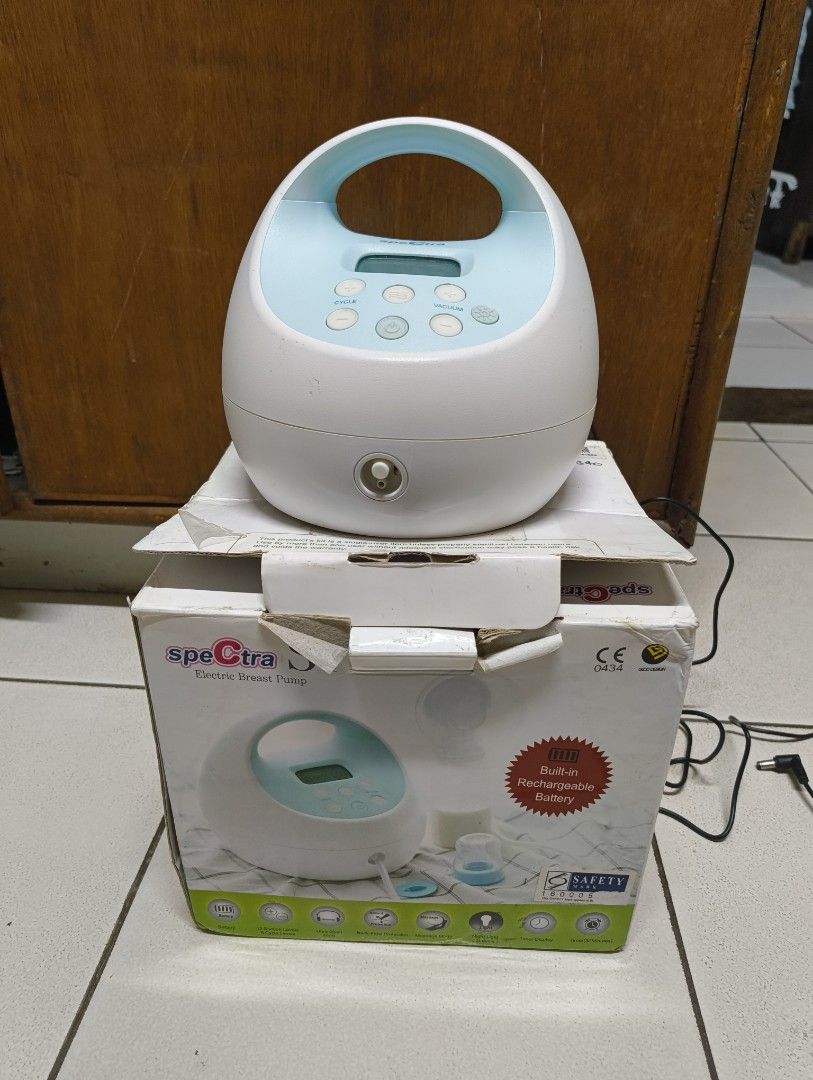 Spectra S1 Electric Breast Pump with Box (Category: Breastfeeding & Bottle Feeding) located in Antipolo. Submitted by kei.regalado (Listing ID 1470862259, Image 1). Description: - Spectra S1 electric breast pump with built-in rechargeable battery - Includes original box (with minor edge/corner wear) - Original power adapter with 3-pin plug included - Complete accessories: tubes, valves, backflow protectors, and flanges - Features adjustable cycle