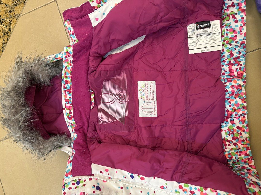 Spyder Kids Ski Jacket and Bib Pants Set Size 4/5 (Category: Babies & Kids Fashion) located in Makati City. Submitted by sellebrity88 (Listing ID 1470873021, Image 2). Description: - Authentic Spyder kids snow set (Jacket Size: 4, Pants Size: 5) - White jacket with playful colorful polka dots and detachable faux fur hood trim - Stylish purple bib snow pants with matching bubble print - 3M Thinsulate insulation keeps little ones extra warm on the 