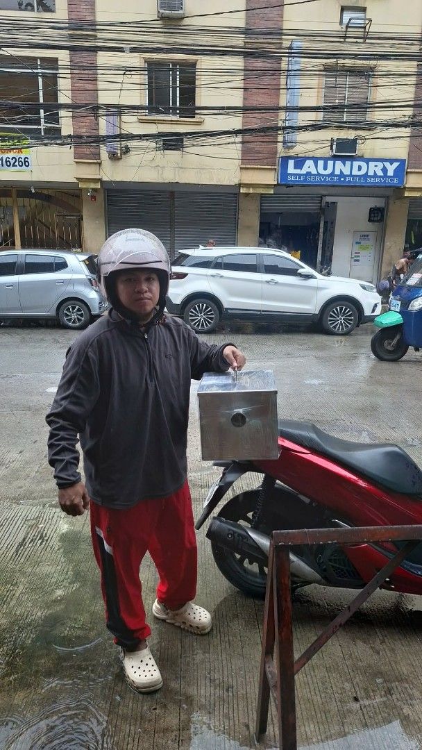 Stainless Steel Grease Trap for Kitchen Sink (Category: Bathroom & Kitchen Fixtures) located in Manila. Submitted by keencrystal.b88cf4 (Listing ID 1470744348, Image 1). Description: - Heavy-duty stainless steel construction - Includes internal filter basket and drainage pipes - Removable lid with a convenient metal handle - Prevents clogged plumbing for homes and restaurants - Solid, durable, and built to last.