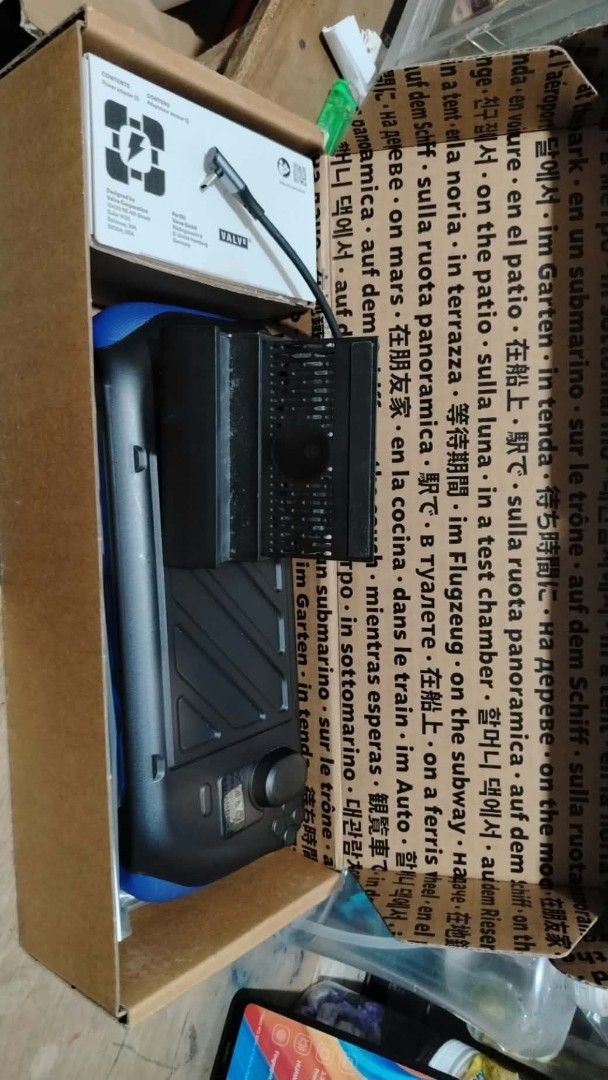 steamdeck oled 512gb (Category: Others) located in Rizal. Submitted by neeekkuuu (Listing ID 1470928855, Image 3). Description: - Item: Valve Steam Deck Handheld Console - Color: Black - Condition: Tested, turns on and loads up properly - Inclusions: Original charging adapter, protective case, protective grip shell, desktop dock, and box packaging - Perfect for: Portable PC gaming on the go.