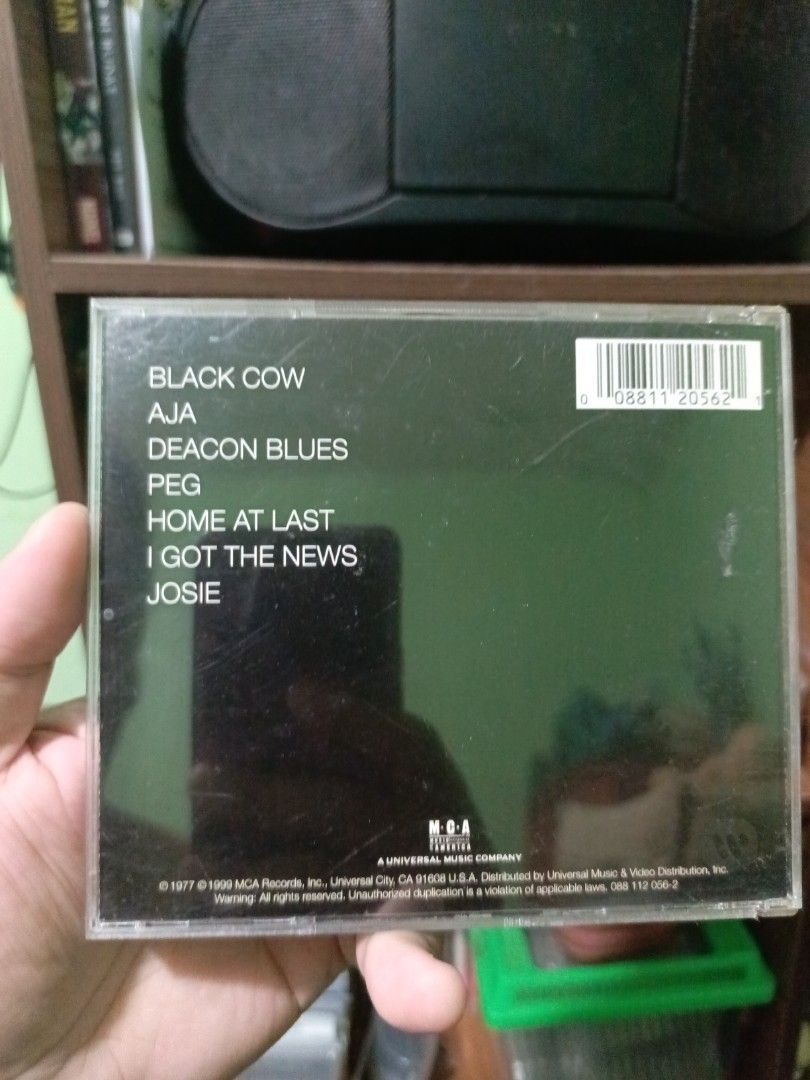Steely Dan Aja CD Album (Category: CDs & DVDs) located in Manila. Submitted by crashandburn101 (Listing ID 1470927991, Image 2). Description: - Title: Aja by Steely Dan - Format: Audio CD - Condition: VG+ on CD, Front inlays has some crumpled texture due to age and storage. Tested and plays perfectly..