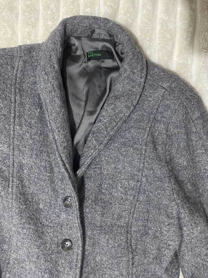 Stile Benetton Fitted Grey Wool Blend Jacket (Category: Coats, Jackets and Outerwear) located in Caloocan City. Submitted by bea_d_ (Listing ID 1470770049, Image 2). Description: STILE BENETTON Grey Fitted Wool-Blend Jacket Classic, tailored Stile Benetton button-down jacket featuring an elegant shawl collar, structured seam detailing, piped faux pockets, and full interior lining. Perfect for autumn/winter travel, chilly office spaces, or sophist
