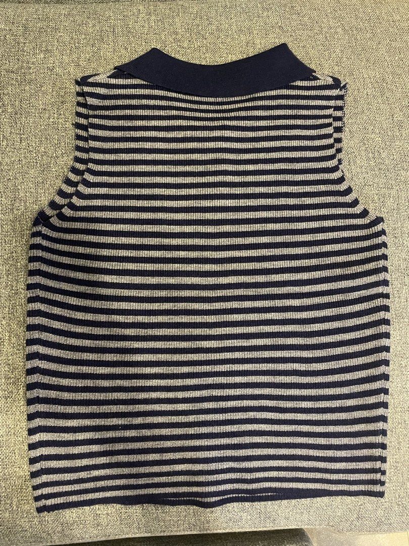Stripes Ribbed Knit Sleeveless Top (Category: Sleeveless) located in Quezon City. Submitted by mfordma (Listing ID 1470870605, Image 2). Description: BRAND NEW Originally bought for 450.00 Doing a little closet decluttering! ✨ Letting go of some pieces that are still in great condition and looking for a new home. 🤍 Brand: No Brand (from China) Size: Free size Color: Navy and Gray Description: - Very stretchable striped ribbed knit fabric - Sleev