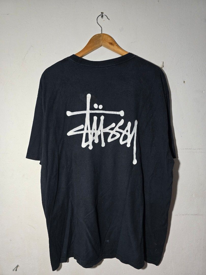 stuci basic tee (Category: Tshirts & Polo Shirts) located in Kuala Lumpur. Submitted by humble_.thrift (Listing ID 1470841108, Image 3). Description: -Pit 26 -Labuh 30.5 - Brand: Stussy - Color: Black - Size: XL - Material: 100% Cotton (Made in Mexico) - Design: Small white chest logo & large signature back graphic - Condition: Brand new / Excellent - Care: Machine wash cold, tumble dry low - Trusted Carousell seller, DM for fast deal!.