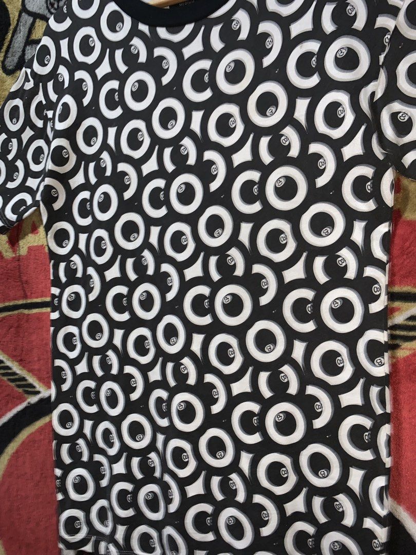 Stussy 8-Ball All-Over Print Tee (Authentic) (Category: Tshirts & Polo Shirts ) located in Tayug. Submitted by cvcthrift (Listing ID 1470896438, Image 3). Description: 21/31 NO ISSUE EXCELLENT CR-9.5/10 - Brand: Stussy - Design: All-over 8-ball graphic print with major city names (New York, London, Tokyo, Los Angeles) - Color: Classic Black and White - Size: Medium (Regular crewneck fit) - Material: 100% Cotton - Care: Hand wash recommended - Con