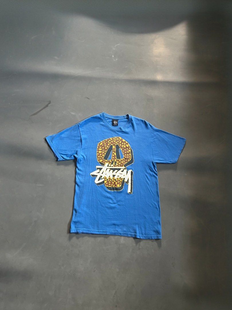 Stussy Blue Skull Graphic Tee (Category: Tshirts & Polo Shirts ) located in General Santos City (Dadiangas). Submitted by nofuckingli (Listing ID 1470882167, Image 1). Description: Stussy Blue Skull Graphic Tee Length: 28 Width: 19 Color rate: 9.2/10 Condition: 9/10 Issue: Hairlines.