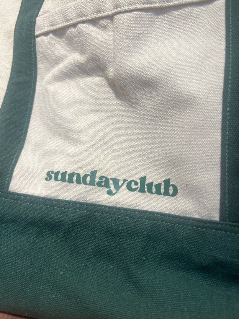 Sunday Club Canvas Tote Bag (Category: Tote Bags) located in Manila. Submitted by malggg (Listing ID 1470880692, Image 2). Description: (Making space for new things!) Got this from the 🍊 app many years ago. Used but not abused since I have other canvas totes that I reach for more often. Just the perfect size for carrying everyday essentials, including a laptop, a tumbler, and whatever else you bring haha Has 1 main compartment and front and back