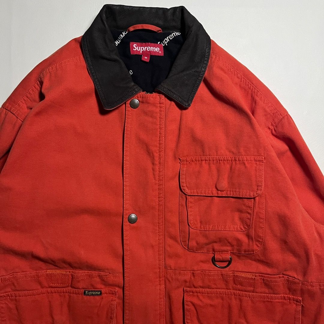 Supreme FW19 Orange Field Jacket (Category: Coats, Jackets and Outerwear) located in Caloocan City. Submitted by achilles_grails (Listing ID 1470844472, Image 3). Description: - Brand/Model: Supreme FW19 Orange Field Jacket - Color: Vibrant orange with dark contrasting collar - Design: Utility style with multiple front cargo pockets and D-ring attachment - Interior: Fully lined with classic Supreme all-over print - Condition: Excellent pre-owned 