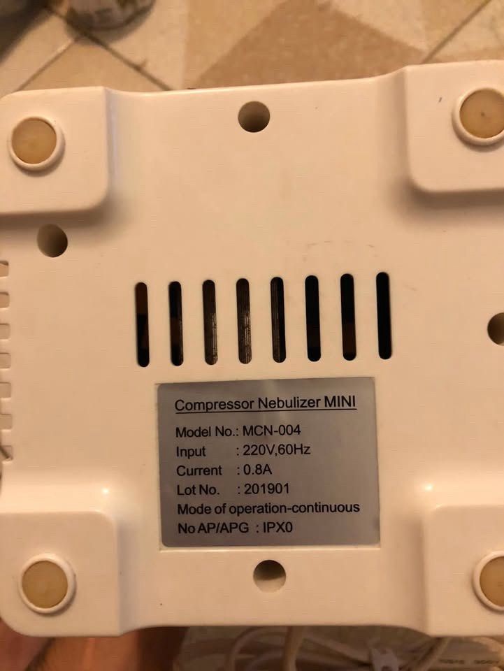 Surgitech Compressor Nebulizer Mini MCN-004 (Category: Medical Supplies & Tools) located in Manila. Submitted by oldbeamco. (Listing ID 1470930494, Image 2). Description: - Brand: Surgitech - Model: MCN-004 Mini Compressor Nebulizer - Color/Design: Compact white plastic housing with built-in power switch and coiled cord - Power: 220V, 60Hz, 0.8A - Operation: Continuous mode, IPX0 rated - Features: 4 rubber feet at the bottom for anti-slip stabili