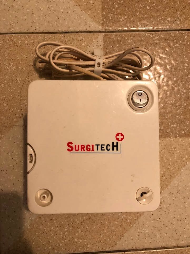 Surgitech Compressor Nebulizer Mini MCN-004 (Category: Medical Supplies & Tools) located in Manila. Submitted by oldbeamco. (Listing ID 1470930494, Image 1). Description: - Brand: Surgitech - Model: MCN-004 Mini Compressor Nebulizer - Color/Design: Compact white plastic housing with built-in power switch and coiled cord - Power: 220V, 60Hz, 0.8A - Operation: Continuous mode, IPX0 rated - Features: 4 rubber feet at the bottom for anti-slip stabili