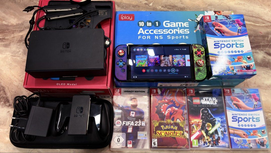 Switch OLED bundle / separate (Category: Nintendo) located in Klang. Submitted by naim.ting88 (Listing ID 1470927969, Image 1). Description: WTS bundle all in or separate BUNDLE ( RM 1500) nego - full set nintendo oled with box - fan for tv dock - memory card 64gb - console bag - 6 digital games 1. Mario kart 8 2. Mario smash bros 3. Luigi mansion 3 4. Little nightmare 3 5. Minecraft 6. Fortnite Physical game (7pcs) 1) switch sport + 10 in 1 acce